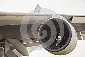 Close up shot of airplane engine and propeller on white background