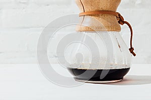 Close up shot of alternative coffee in chemex with filter cone