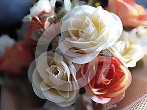 A close up shot of an artificial flower bouquet