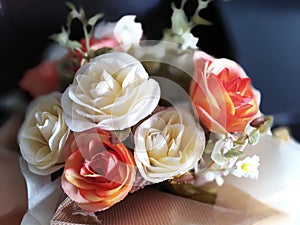 A close up shot of an artificial flower bouquet