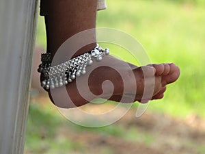 Close up shot of beautiful Anklets in food.