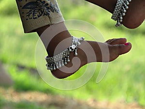 Close up shot of beautiful Anklets in food.