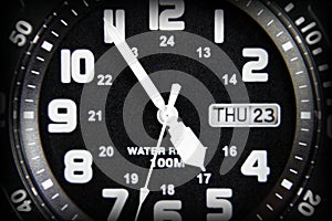 Close-up shot of a black wristwatch