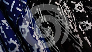 Blue and black batik shirts.