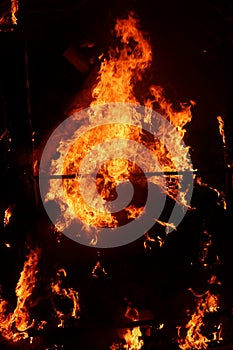 Close-up shot of bonfire igniting intense fire heat image for background