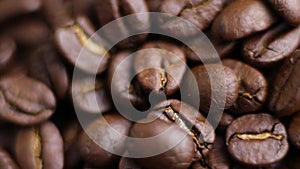 Close-up shot of brown hot roasted coffee beans