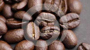 Close-up shot of brown hot roasted coffee beans