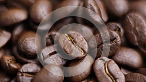 Close-up shot of brown hot roasted coffee beans