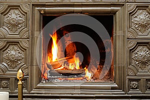 Close up shot of burning firewood in the fireplace