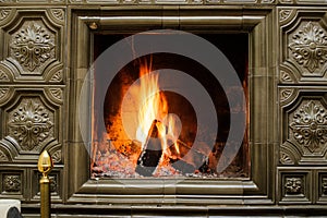 Close up shot of burning firewood in the fireplace