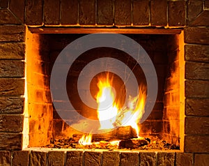 Close up shot of burning firewood in the fireplace