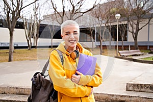 Close up shot of cheerful happy caucasian teenage girl looking at camera smiling. Funny portrait of a young