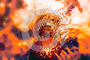 Close-up shot of Christmastide decoration with mirror ball and f photo