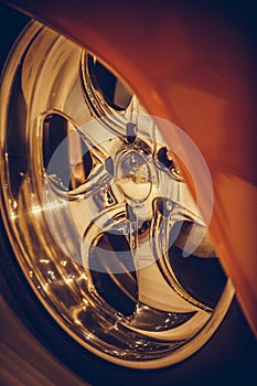 Chrome classic wheel rim on a vintage car