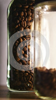 Close up shot of coffee beans inside a bottle