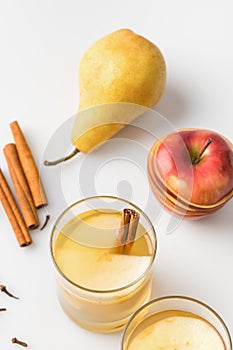 close-up shot of delicious spiced cider with apple and pear