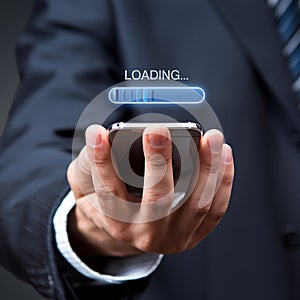 Businessperson Using Smartphone Showing Loading Progress Bar photo