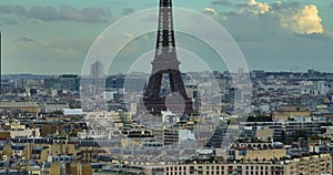 Close-up shot of the Eiffel tower on a drone from a height. Aerial Panorama of Paris Cityscape. Parallax effect