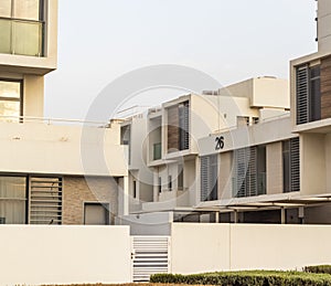 Close up shot of a facade of a modern townhouses. City