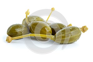 Close-up shot of few marinated capers fruits photo