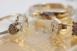 Close up shot of fine gold jewellry set