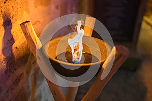 Close up shot of flaming torch and fire.