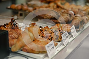 Close-up shot of fresh croissants on a vitrine