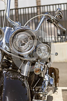 Close-up shot of the front of a custom motorcycle with selective focus