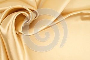 Close-up shot of gold satin texture background