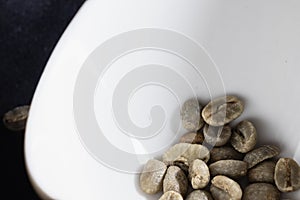 Close-up shot of green unroasted coffee beans