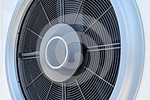 Close-up shot of a heat pump fan for solar systems on the roof