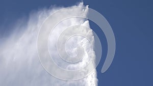 Close up shot of the iconic powerful water jet fountain located in Geneva, Switzerland.