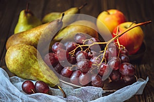 close-up shot of juicy grapes with pears and apples