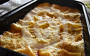 A close up shot of lasagna photo