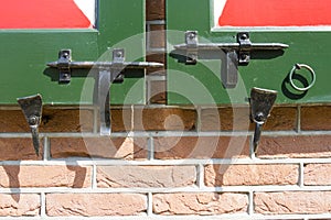 Close-up shot of a latches on wooden Dutch doors