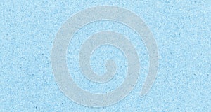Close-up shot of light blue paper texture pattern