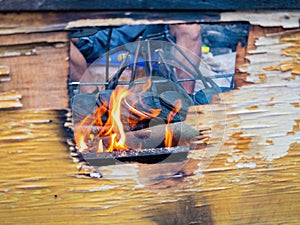 Close up shot of man grilling  food