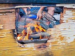 Close up shot of man grilling  food