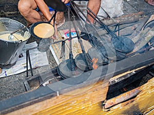 Close up shot of man grilling  food