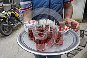 Close Up Shot of Man Holding Tea Tray