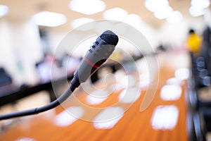 Close-up shot of microphone in conference room on bokeh light background