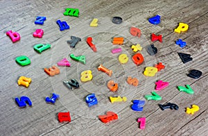 Plastic Letters Alphabet Images on wooden table