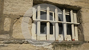 Close up shot of old prison window with bars. High quality