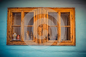 Close up shot of old wooden hut window.Vlkolinec,traditional settlement village in the mountains.