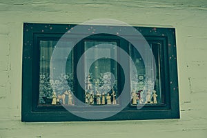 Close up shot of old wooden hut window.Vlkolinec,traditional settlement village in the mountains.