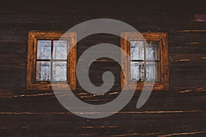 Close up shot of old wooden hut window.Vlkolinec,traditional settlement village in the mountains.