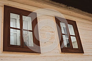 Close up shot of old wooden hut window.Vlkolinec,traditional settlement village in the mountains.