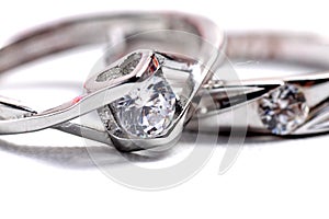 Close up shot of pair engagement /  mariage rings isolated