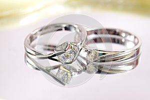 Close up shot of pair engagement /  mariage rings isolated