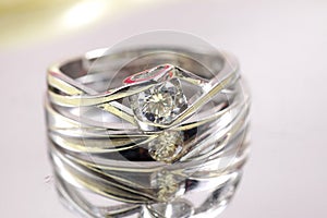 Close up shot of pair engagement /  mariage rings  photo